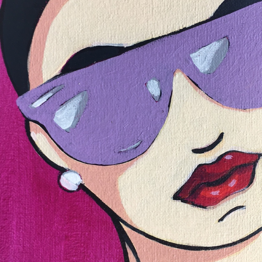 1980’s inspired woman w/ shades and pearls